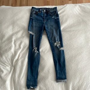Distressed super high rise jegging